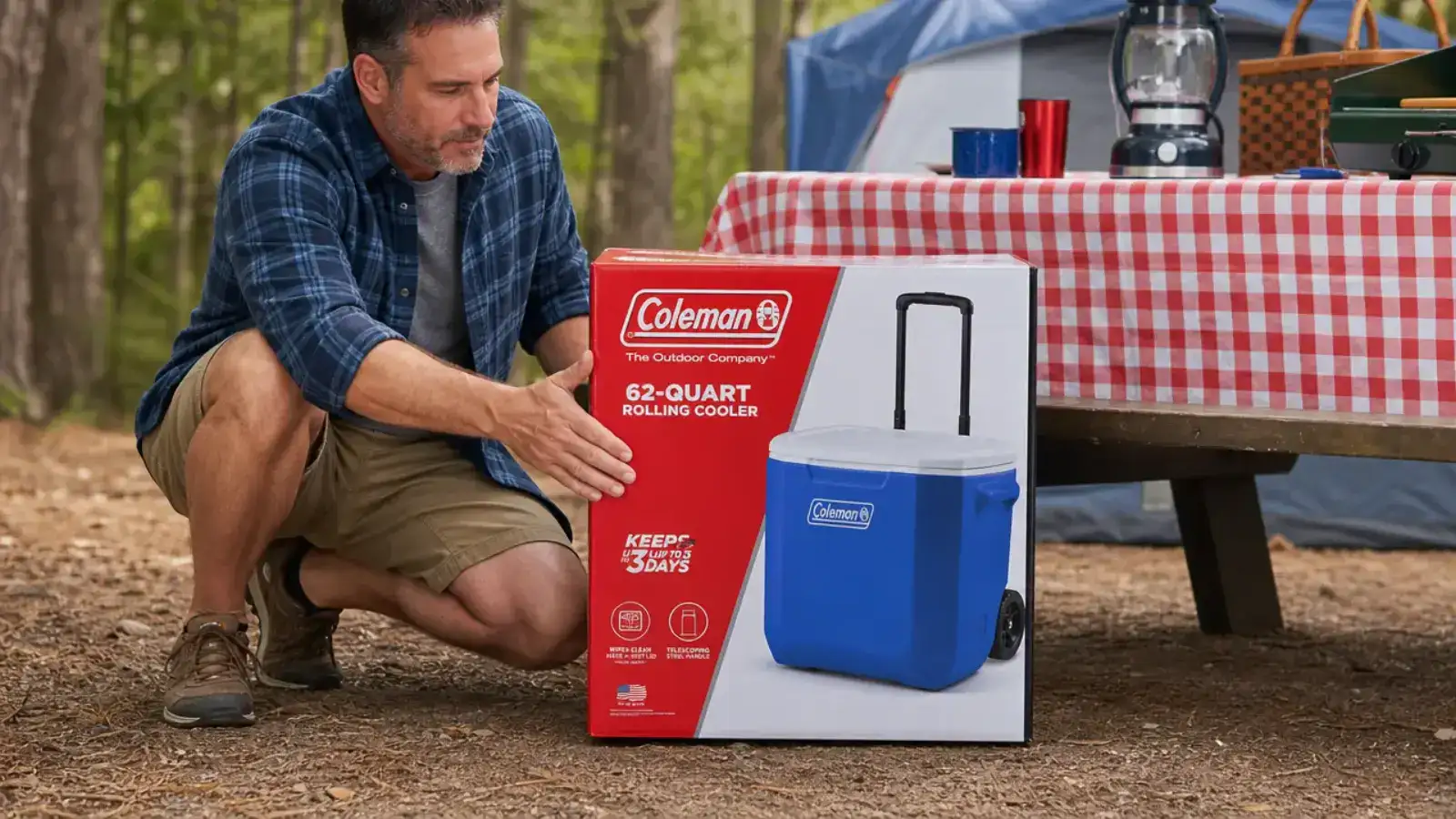 Hand pulling out a cold water bottle from the open Coleman rolling cooler filled with ice and food containers